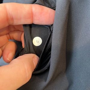 Lululemon size 6 lightweight zip up hoodie with hood that can be tucked away